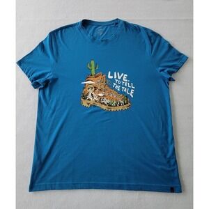 TRO T Shirt blue color size XL with an image of an adventure With A Haking Boot